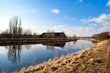 Dutch farm house by river