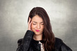 Brunette girl with headache