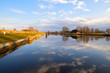 Dutch farmhouse by wide river
