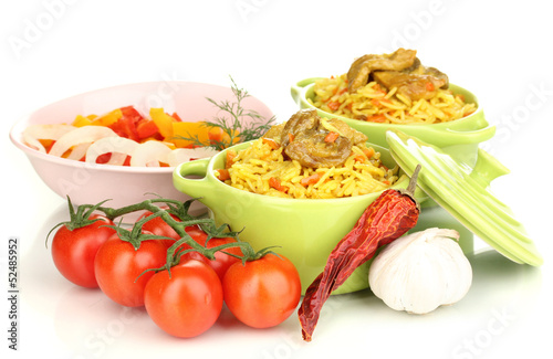 Photo: Delicious pilaf with vegetables isolated on white Delicious pilaf with vegetables isolated on white