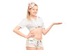 Photo: Young female in short pants gesturing Young female in short pants gesturing