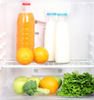 Open refrigerator with vegetarian food