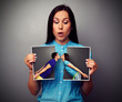 amazed woman looking at disrupt photo