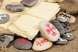 Fortune telling  with symbols on stones on burlap background