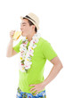 happy young man drinking beer at summer