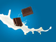 Photo: milk and chocolate splashing milk and chocolate splashing