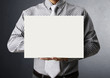 Photo: handing a blank business card over handing a blank business card over