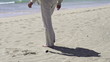 Happy, excited young handsome man relaxing on beach