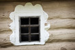 Window of ancient Ukrainian hut. Clay covered wall