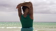 Woman standing on the beach, super slow motion, shot at 240fps