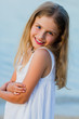 Photo: Summer joy - portrait of lovely girl on the beach Summer joy - portrait of lovely girl on the beach