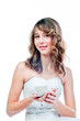 Young and beautiful  woman drinking coffee from a white cup