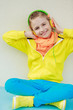 Cute young girl enjoying music