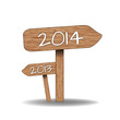 Wooden signs indicating the way for 2014