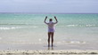 Woman relaxing on the beach, super slow motion