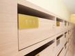 Wooden mailbox in apartment