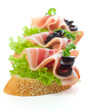 appetizers - bread slices with bacon and salad
