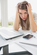 Businesswoman getting stressed