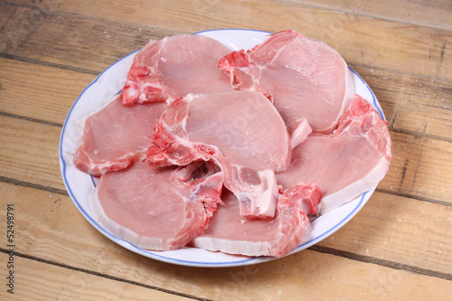 Photo: chuletas de cerdo crudo chuletas de cerdo crudo