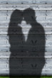 Shadows of couple embracing