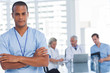 Photo: Serious doctor with arms crossed Serious doctor with arms crossed