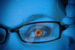Photo: Woman with orange eye wearing glasses Woman with orange eye wearing glasses