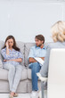 Woman crying on the couch