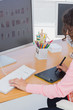 Photo: Editor using graphics tablet to do work Editor using graphics tablet to do work