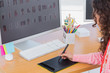 Editor using graphics tablet to edit