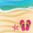 beach background with sandals and starfish