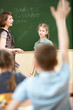 School kids in classroom at math lesson