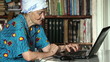 old woman using laptop