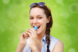 Young woman eating frozen treat