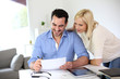 Photo: Middle-aged couple working from home Middle-aged couple working from home