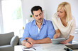 Middle-aged Couple Working Fro...