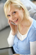 Portrait of blond girl talking on the phone