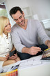 Photo: Couple working on home remodellng Couple working on home remodellng