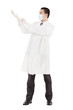 Young doctor standing and putting on his  gloves