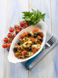 Photo: squid with tomatoes olives and capers squid with tomatoes olives and capers
