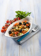 Photo: squid with tomatoes olives and capers squid with tomatoes olives and capers