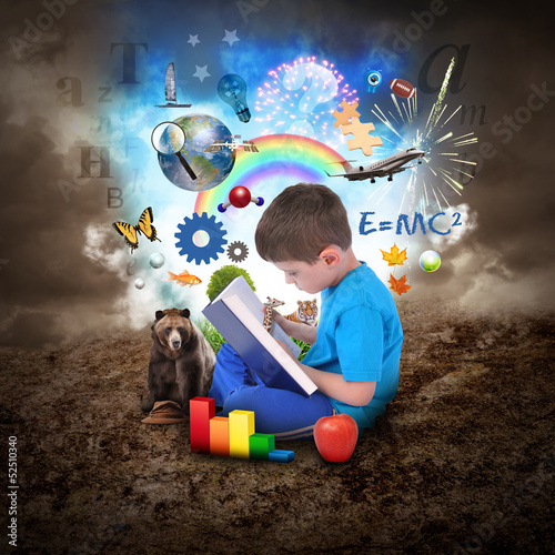 Photo: Boy Reading Book with Education Objects Boy Reading Book with Education Objects