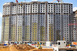 The construction site. The construction of a large building.