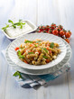 Foto: pasta with feta cheese fresh tomatoes and mint leaf pasta with feta cheese fresh tomatoes and mint leaf