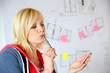 Photo: Girl thinking about what noting on paper Girl thinking about what noting on paper