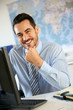 Photo: Cheerful businessman in office Cheerful businessman in office
