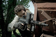 men playing paintball