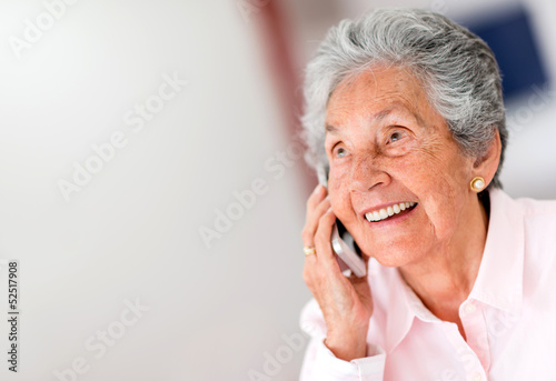 Photo: Happy woman on the phone Happy woman on the phone