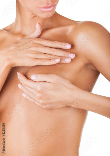 Photo: Female controlling breast Female controlling breast