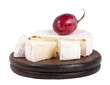 cheeses on the wooden board isolated on white background