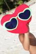 young happy child playing on tropical beach